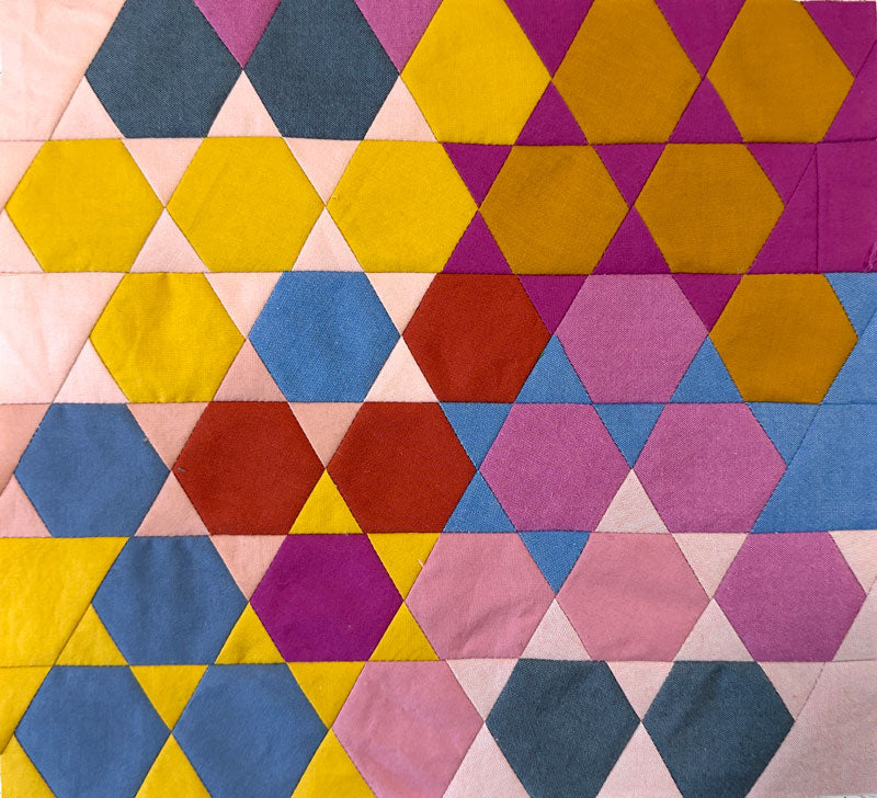 Hexagonal patchwork pattern with multicolor fabric squares