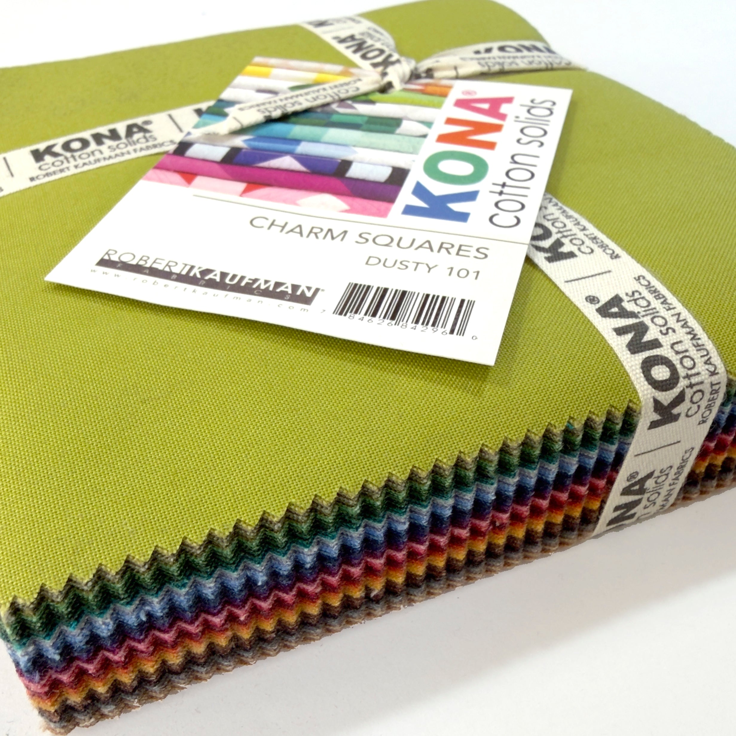 A close up of package of Kina charm squares in bright colors, wrapped with a ribbon.