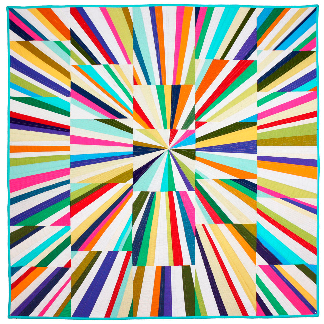 A colorful quilt with radiating lines and solid bright colored fabrics.