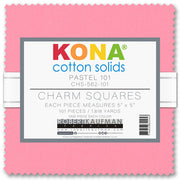 A close up of package of Kina charm squares in bright colors, wrapped with a ribbon.