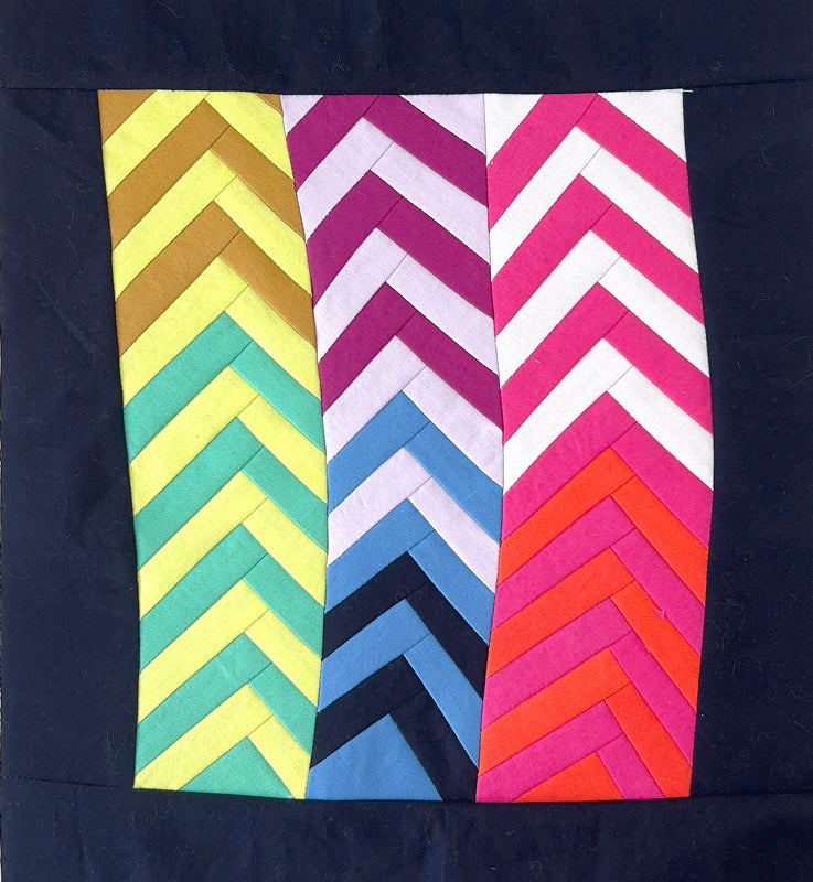 Colorful chevron pattern on a dark background