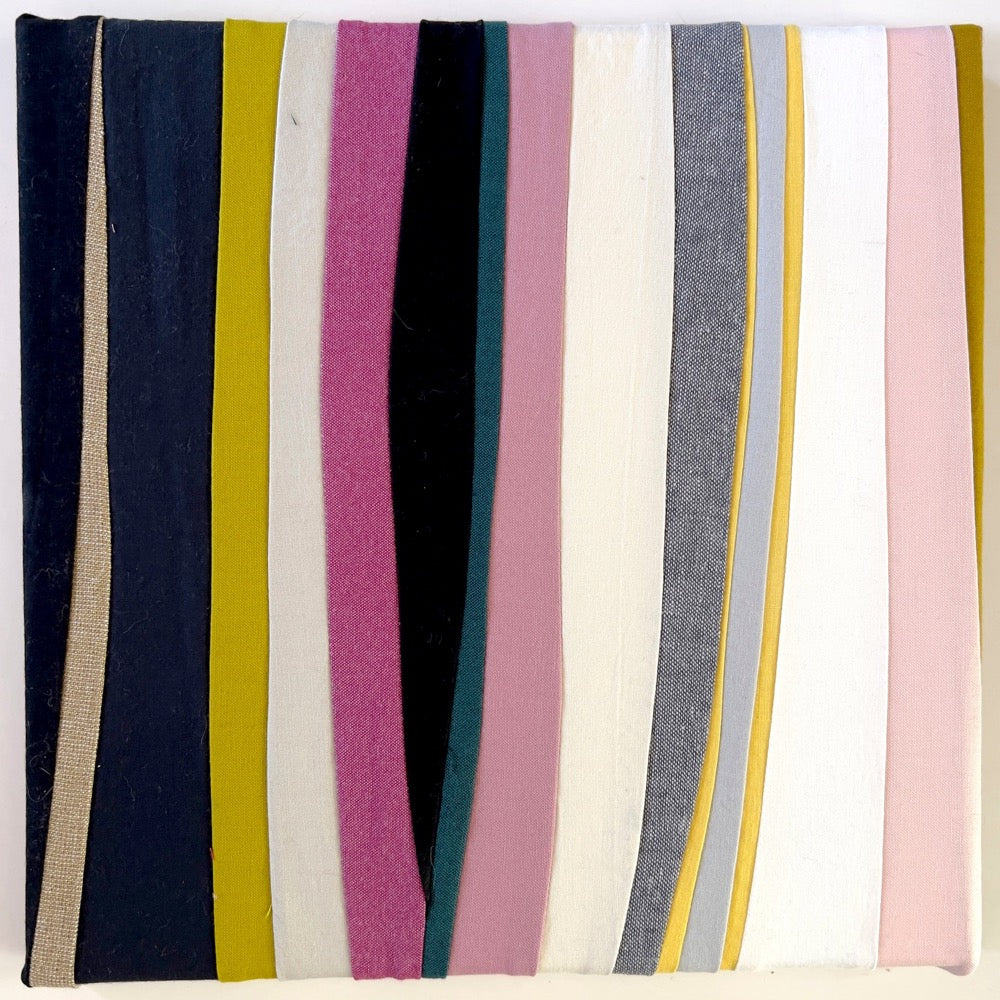 Sewn lines of various widths in pinks, grays, whites and yellows.