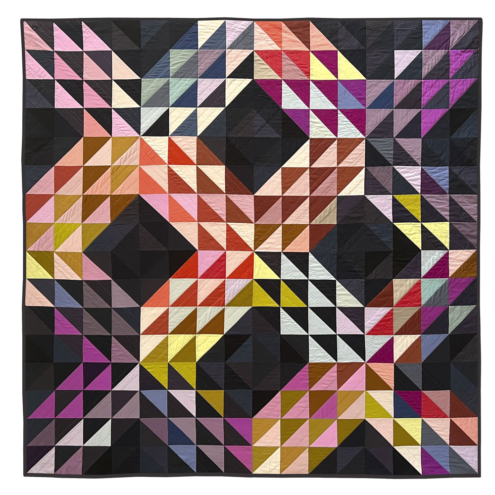 colorful quilt made with half square triangles