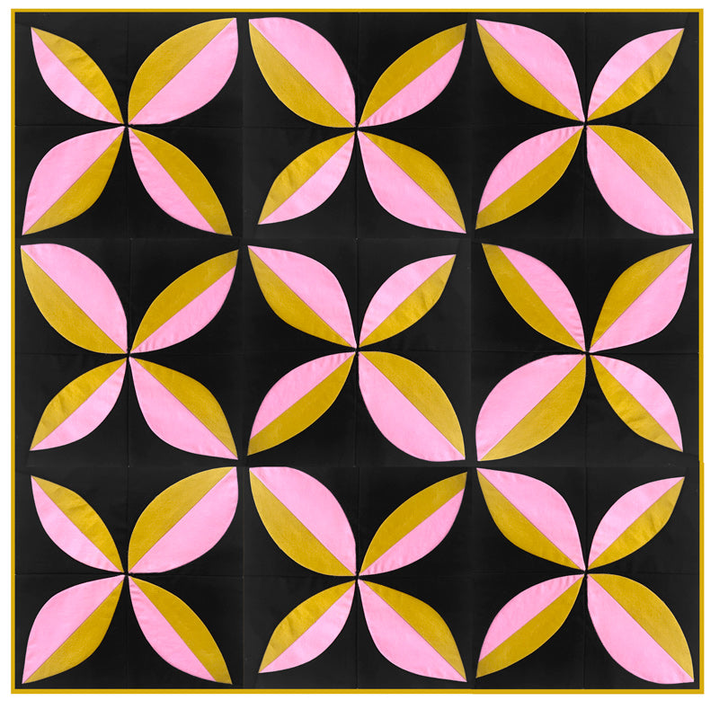 A small quilt study in dusty hues made of ruler free orange peel blocks.