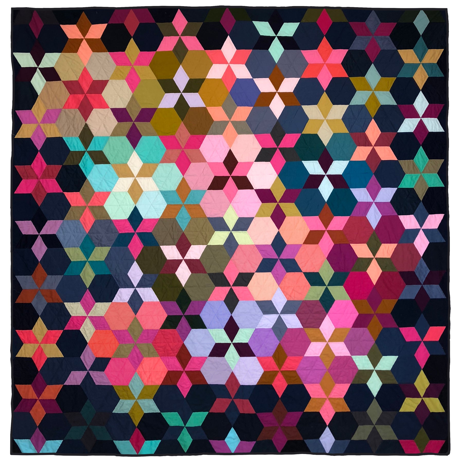 Hand sewn and quilted star quilt in multiple colors with a dark blue background.