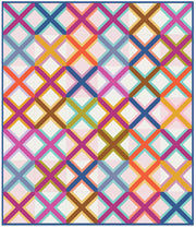 A quilt in bright colors composed of X shaped blocks.
