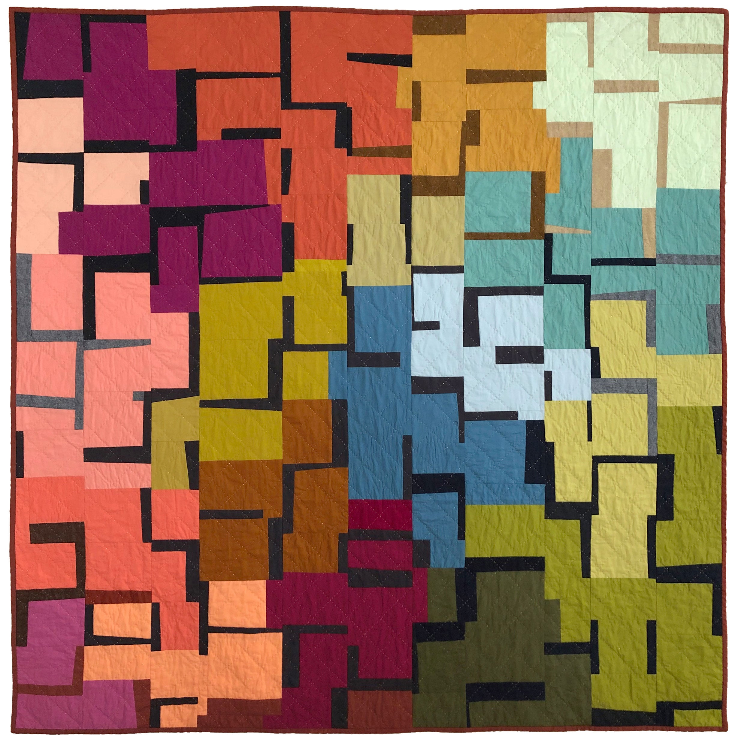 Improvisational quilt made of multiple colors and a dark sashing fabric