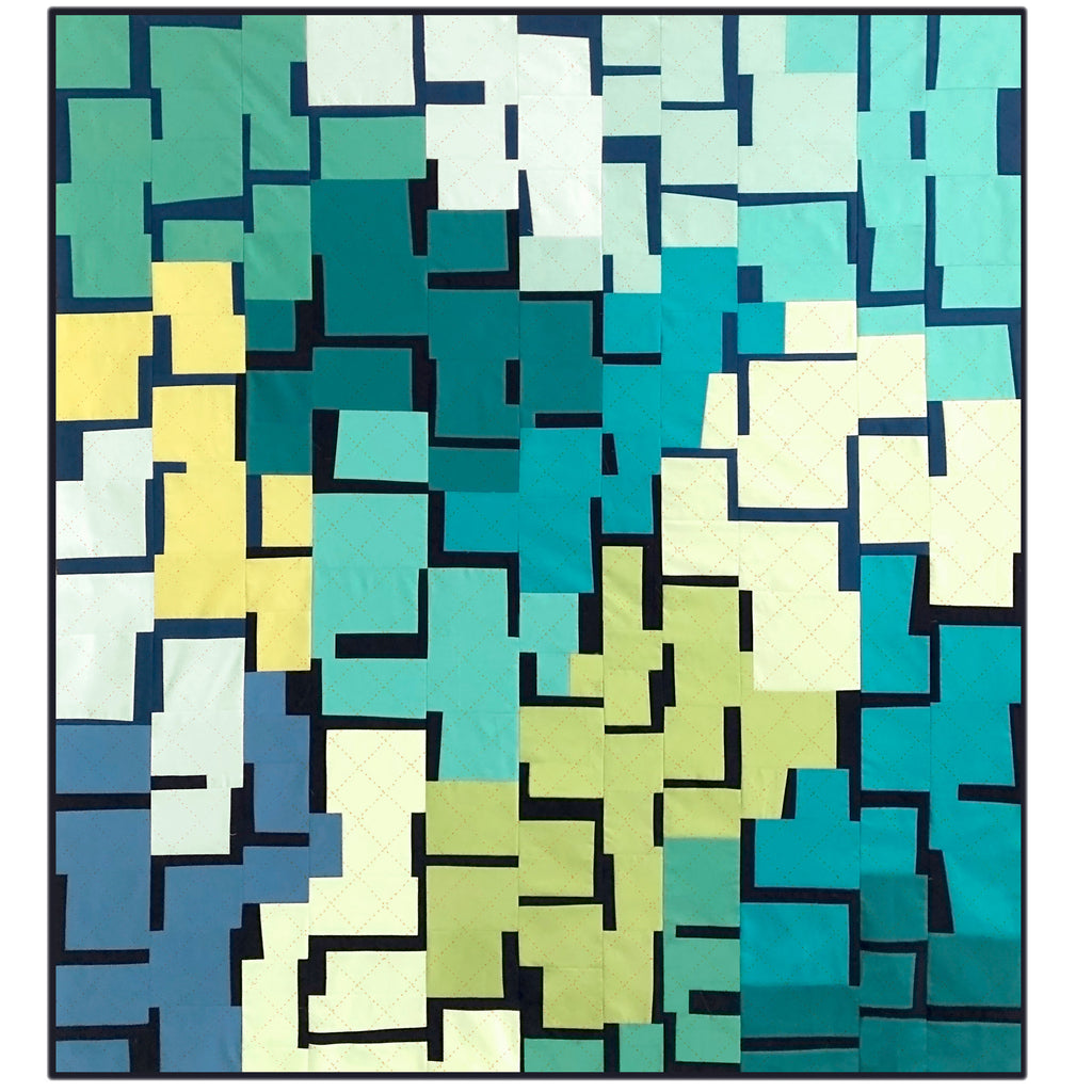 Improvisational quilt made of multiple blue and green colors and a dark sashing fabric